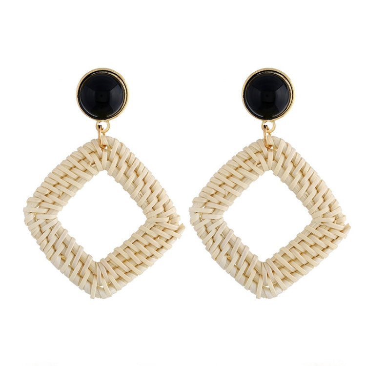 Handmade woven diamond hoop earrings with black stud tops and gold-tone hooks, beige.