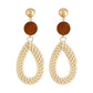 Bamboo vine woven earrings with brown round top and cream teardrop dangle, gold hooks