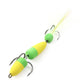 Foam worm lure with three treble hooks and feather tail, yellow and green