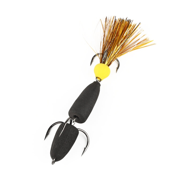 Foam hook worm bait with dark body, yellow head, gold feather tuft, three hooks