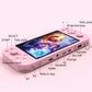 Pink handheld game console showing side ports, function keys, and game screen