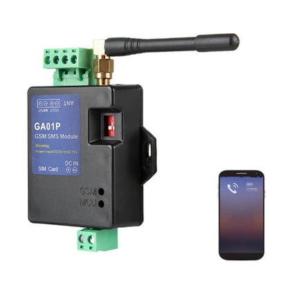 GSM SMS alarm module with long antenna, green terminal block, and DC input