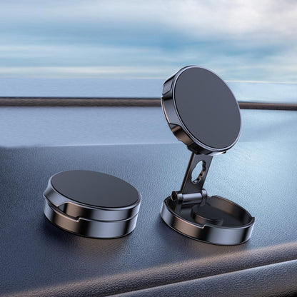Black circular car magnetic suction phone bracket with hinged stand on dashboard