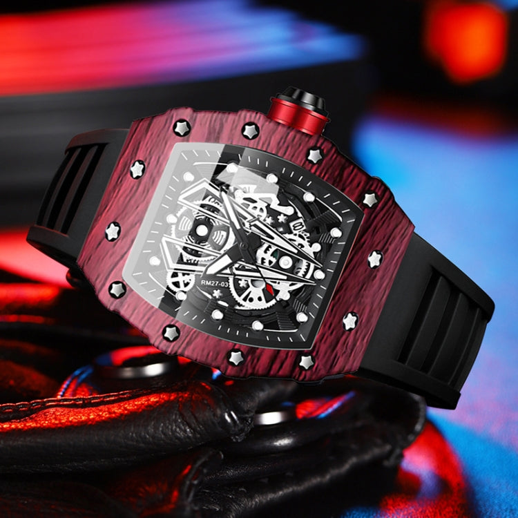 Barrel-shaped sports quartz watch with red textured case and black skeleton dial close-up