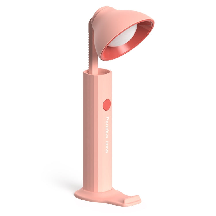 Folding flashlight desk lamp in coral pink with wide oval light head and front stand