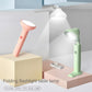 Pink and green folding flashlight table lamps with tilted oval light heads