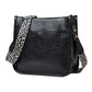Black PU leather crossbody tote bag with leopard-print strap and side accessory pocket