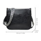 Black PU leather crossbody tote bag with leopard-print strap, front flap and gold hardware