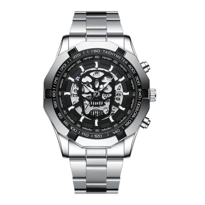 Silver-tone metal wristwatch with black skeleton skull dial and tachymeter bezel