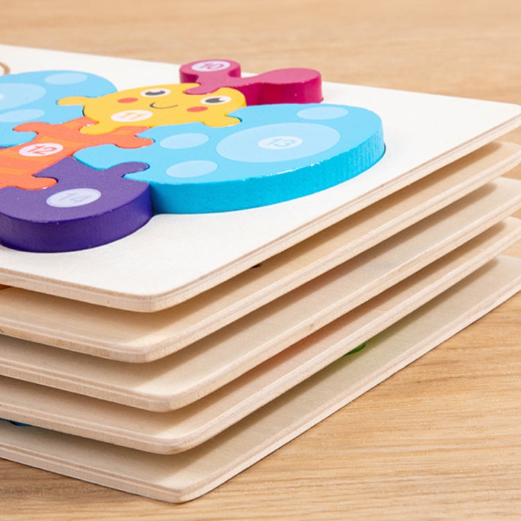 Stack of wooden 3D jigsaw puzzle boards for animal growth toy