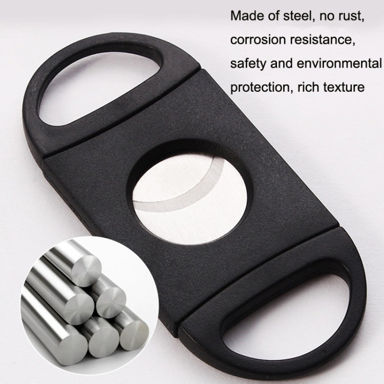 Black steel cigar crusher with oval cutout and silver double-edge blade