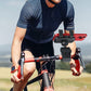 Black handlebar phone holder attached to a bicycle with a secure mounting cradle