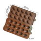 Brown silicone egg chocolate mold with 15 cavities, shown with size markings