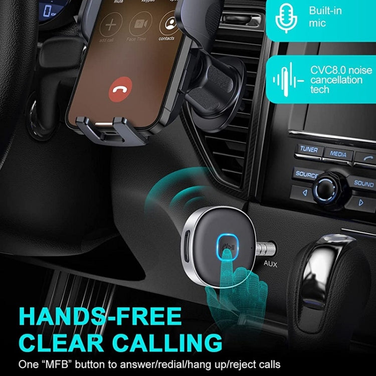 Bluetooth car audio receiver with blue-lit ring button near vehicle console
