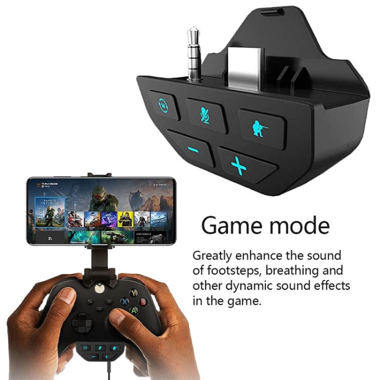 Angled black gamepad sound enhancer adapter with 3.5mm plug on controller