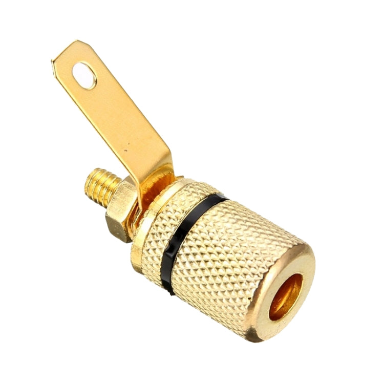 Gold-plated 4mm banana plug terminal with textured grip, spade lug, and center contact