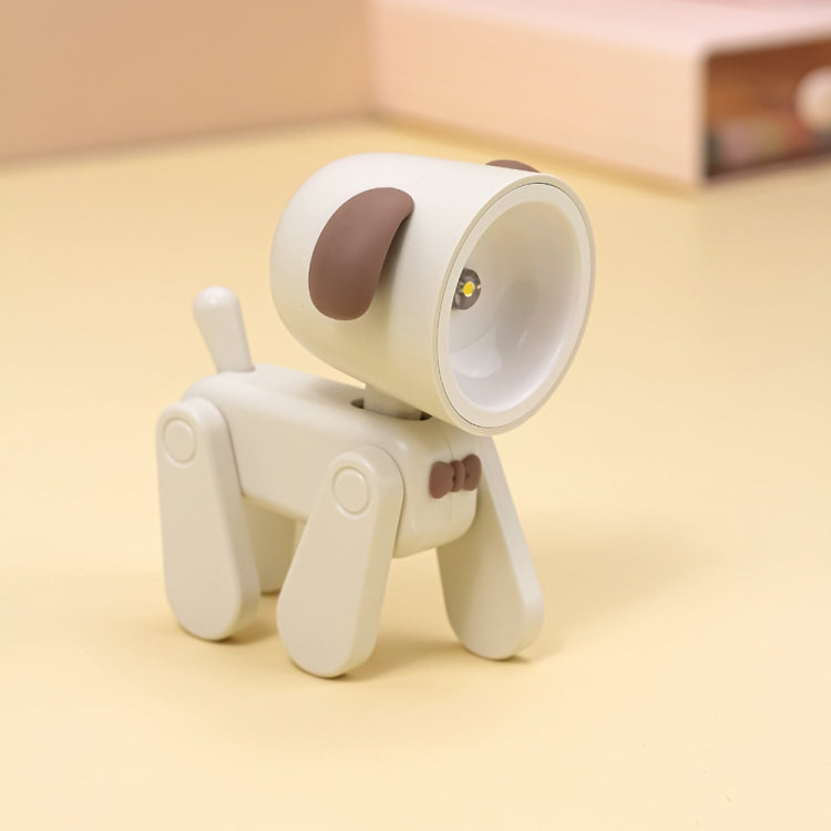 Light beige cartoon mini table night light with dark-brown cap and rotating head.