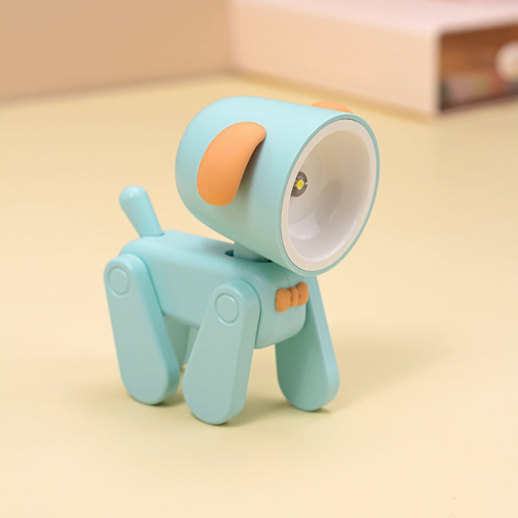 Light blue cartoon mini table night light with orange accent and rotating head.