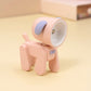 Peach pink cartoon mini table night light with lavender accent and rotating head.