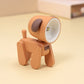 Warm brown cartoon mini table night light with orange accent and rotating head.