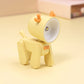 Yellow cartoon mini table night light with orange accent and rotating head.