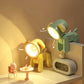 Rechargeable cartoon night light desk ornament, green and yellow character lamps glowing