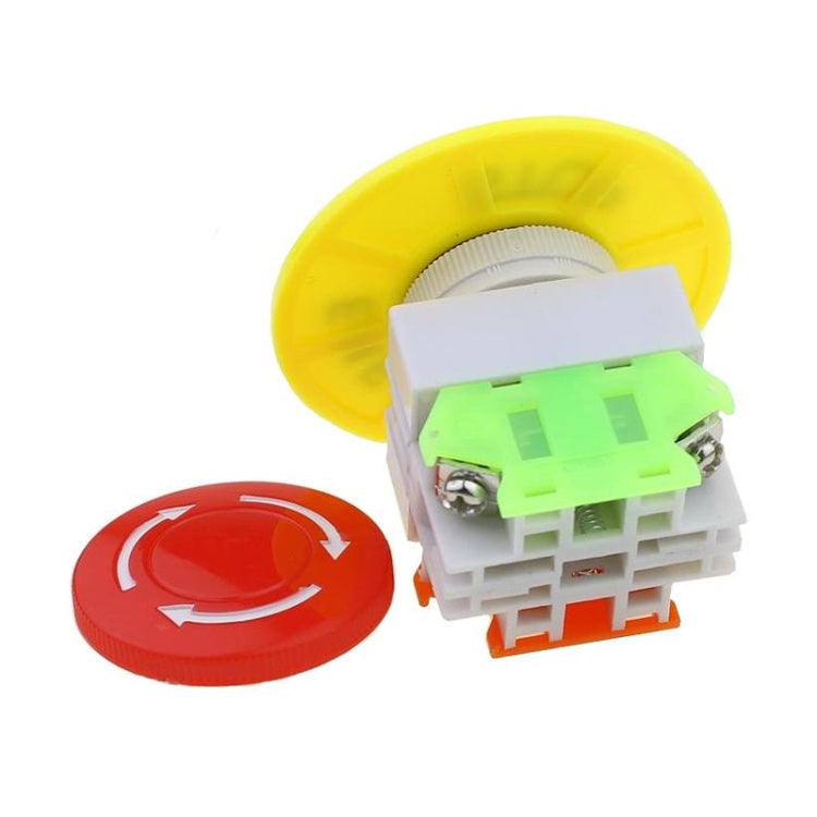 Emergency stop mushroom button with red cap and detached yellow cover, showing wiring