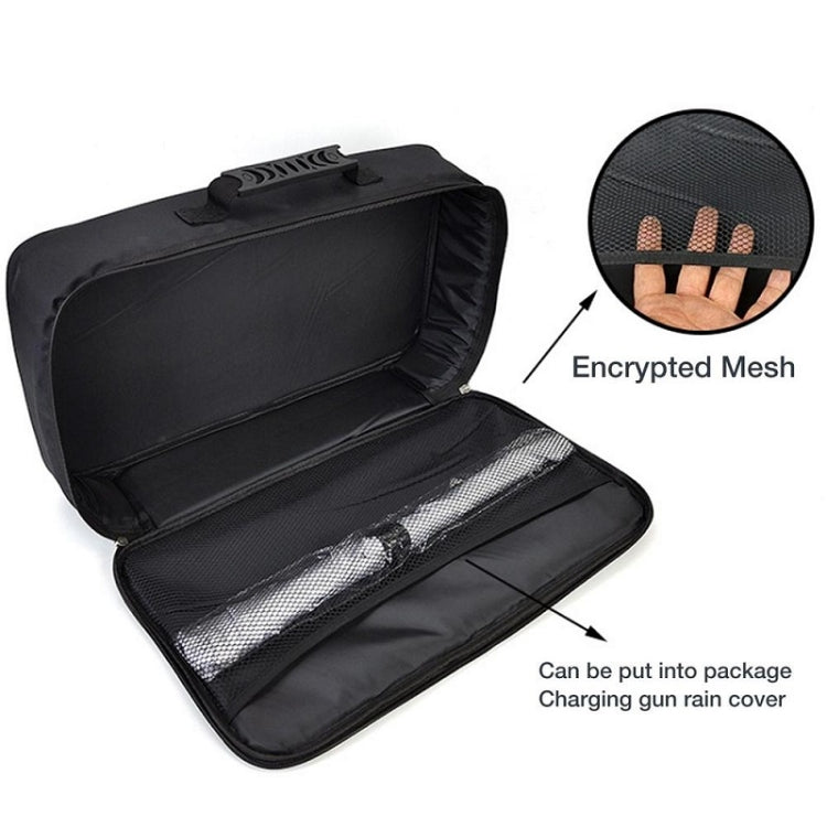 Black open storage bag with mesh inner pocket and top handle; neon green car icon.