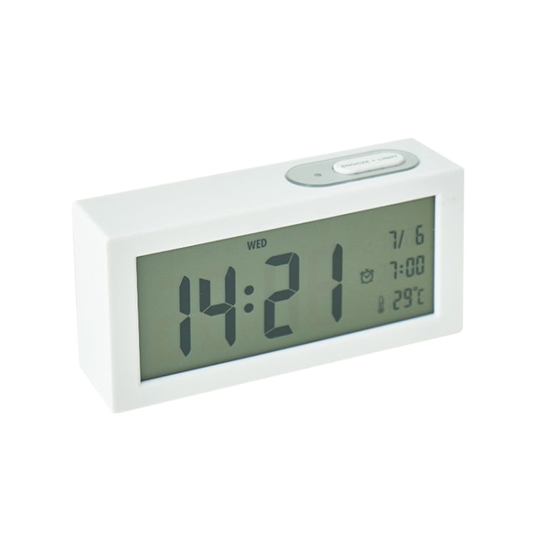 White bedside digital alarm clock with green LCD time, weekday, and temperature