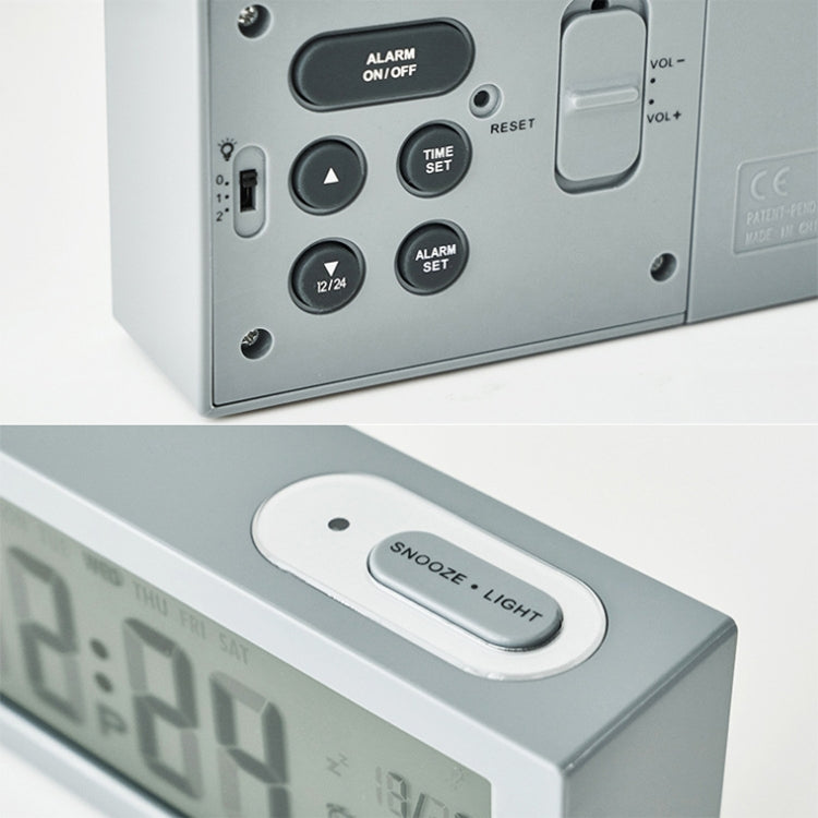 Gray digital alarm clock back panel with Alarm, Time Set, Reset, and volume buttons