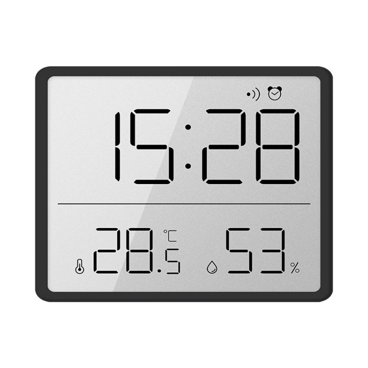 Black LCD digital wall clock showing time, temperature, and humidity readings