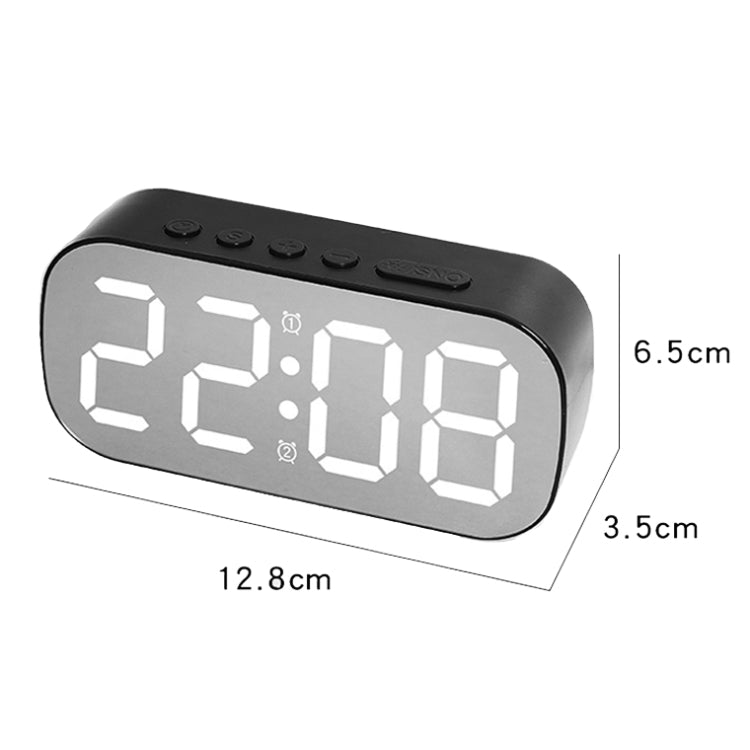 LED desk alarm clock with large digital display and top buttons; size marked