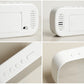 White LED alarm clock showing side speaker vents and control buttons
