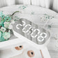 White LED digital alarm clock with white digital time display on stand