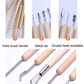 Wood-handled clay sculpting tools showing different metal nibs and double-head tips