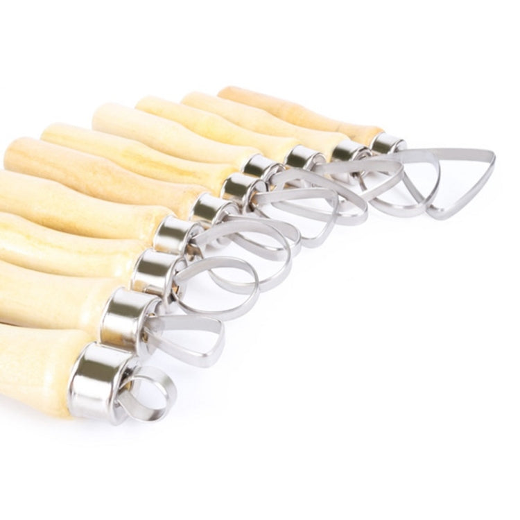 Pottery clay scraper tools with metal ring loop blades on pale wood handles, close-up.