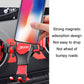 Black and red magnetic phone holder gripping a smartphone on a car dashboard