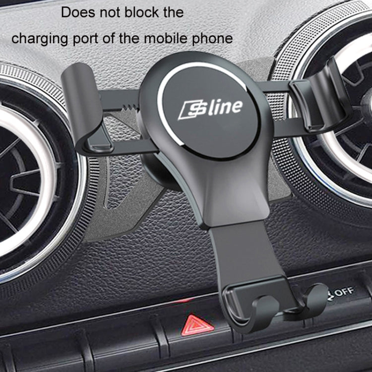 Black magnetic phone holder on car dashboard near air vent, circular Sline pad