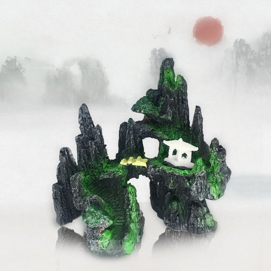 Aquarium mountain resin ornament with dark rocks, green accents, and white window detail