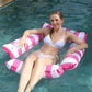 Pink and white striped 4-tube inflatable floating hammock for pool lounging