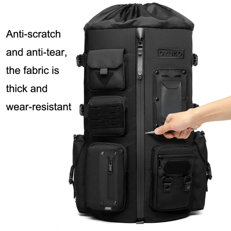 Black waterproof sports backpack front with rugged utility panels and finger at pocket