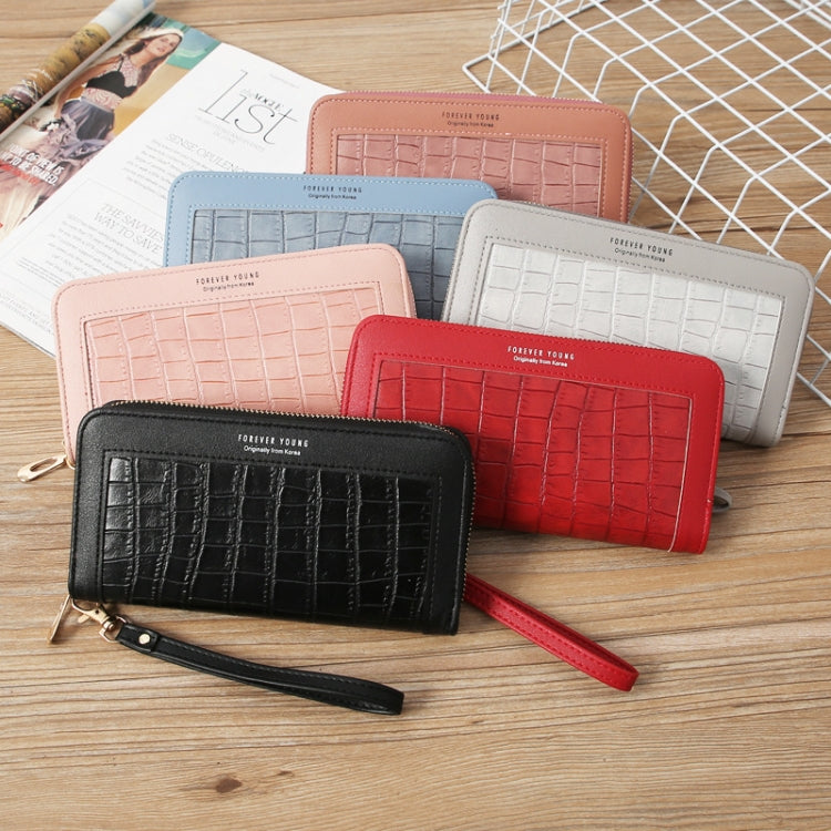 Set of croc-embossed zip wallets in red, black, pink, and light gray with wrist straps