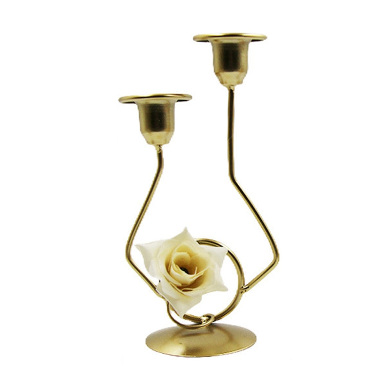 Gold-tone double-headed candle holder with white rose and two cup bases