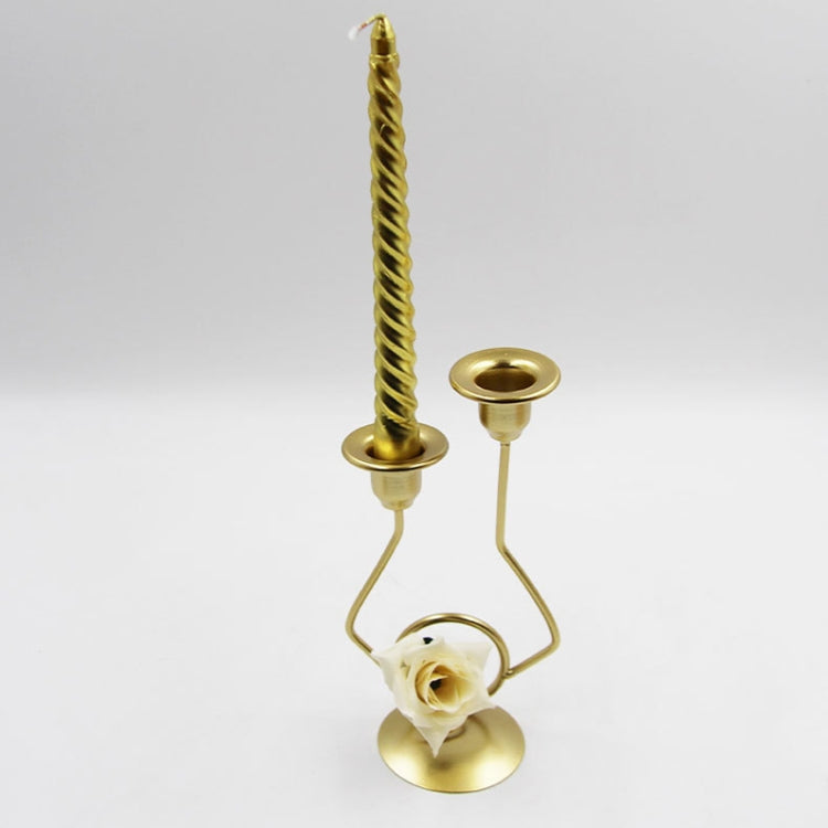 Gold-tone double-headed candle holder with twisted stem and white rose