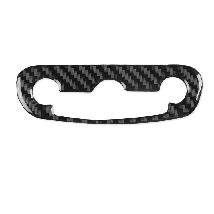 Black carbon-fiber headlight switch sticker with three cutouts