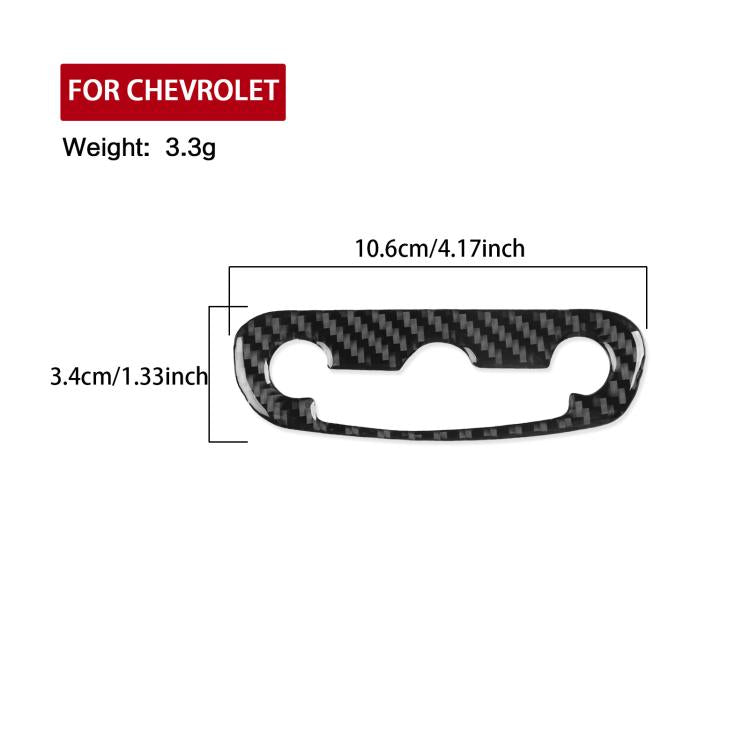 Black carbon-fiber headlight switch sticker, 10.6cm x 3.4cm size