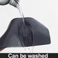 Textured anti-slip car mat under a water stream, curved edge