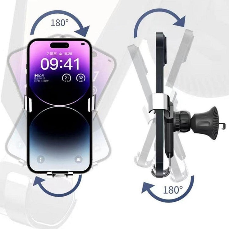 Car air vent phone holder with clamp arms and gravity-style grip, phone mounted