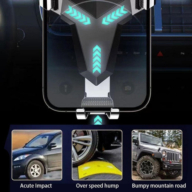 Car air vent phone holder holding a phone with glowing arrow accents on mount