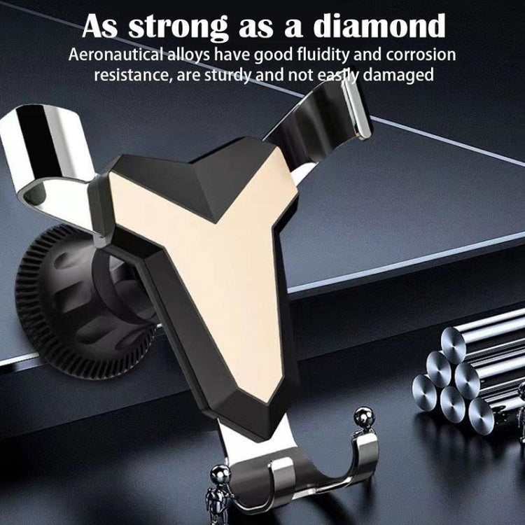Triangular car air vent phone holder with silver mount arms and spherical metal accessories